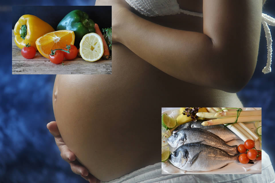 Donna in gravidanza con pesce e vegetali